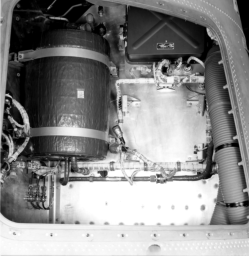 [69862: 12/7/1959]  Aft Unit Instrumentation, using honeycombed Aluminum mounting surfaces. Liquid Nitrogen in-flight cooling tank. Wrapped with insulation, wrapped with duct tape to hold in place.  [CCMD, Ed May]